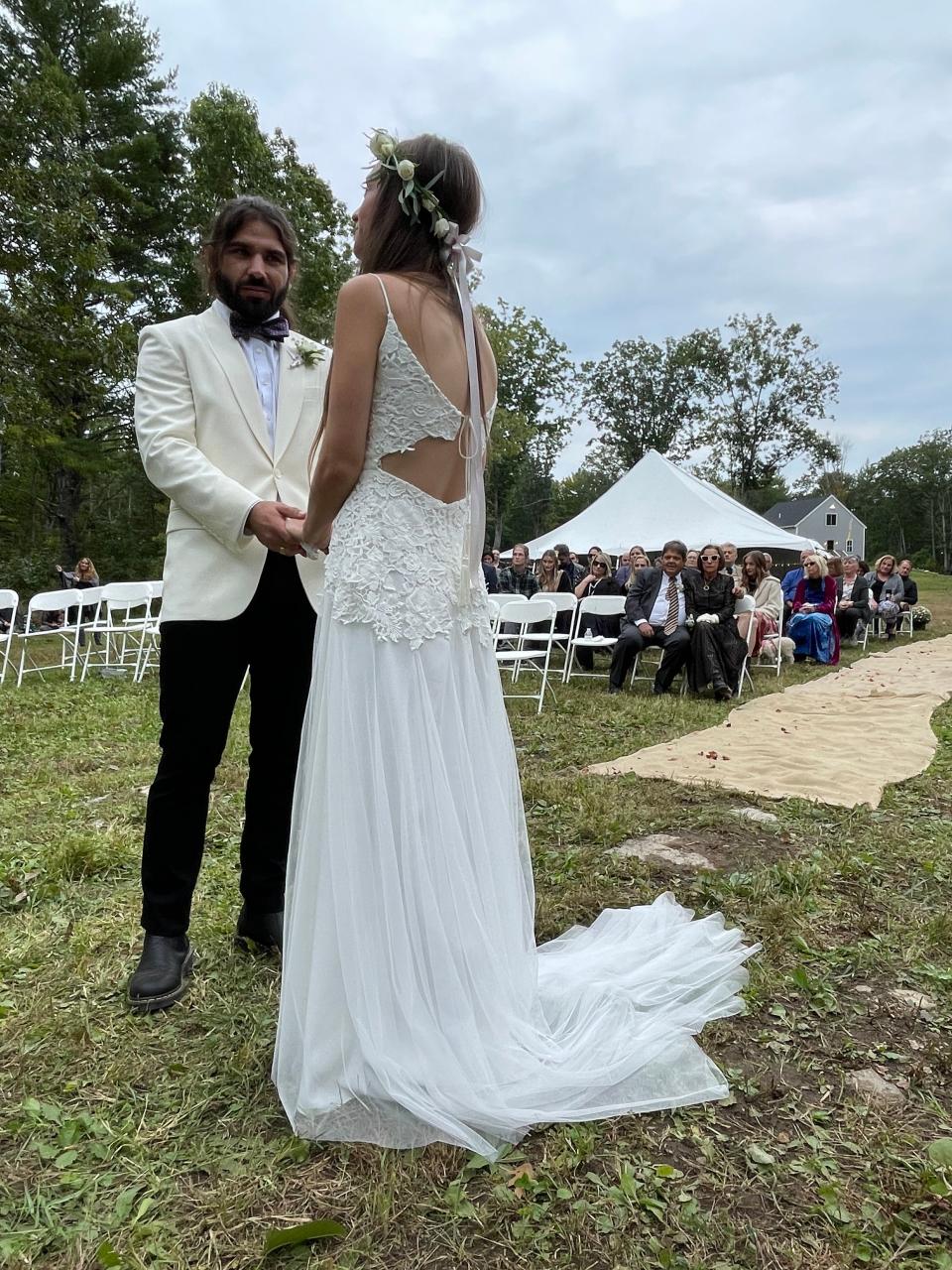 Kelly Ann wasn't picky when it came to her wedding dress, however she did want fabrics and pieces that Anthony could touch and feel to be incorporated.