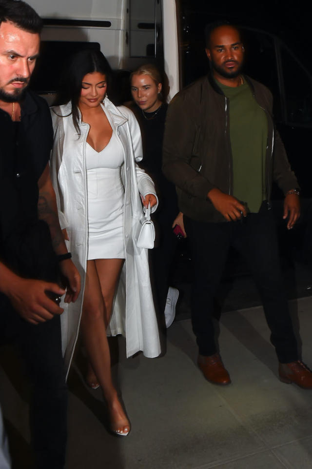 Kylie Jenner bares bump in sheer lace jumpsuit at NYFW