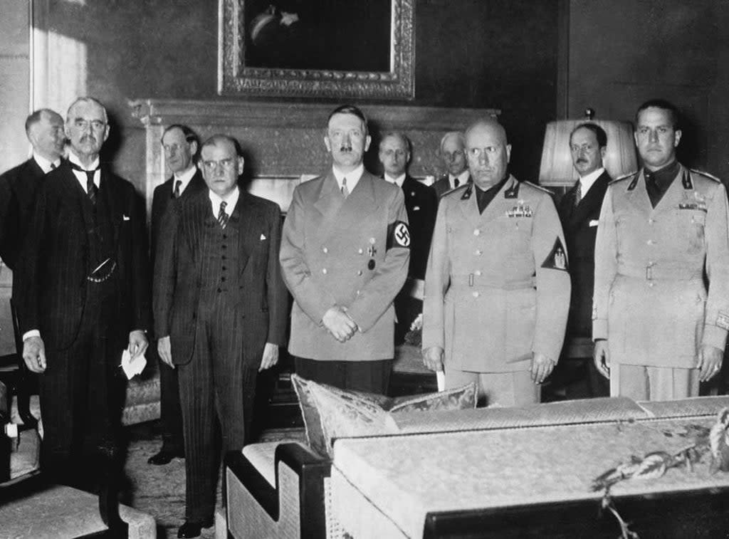 Hitler met with his English, French and Italian counterparts in his office at Munich in 1938 (Getty)