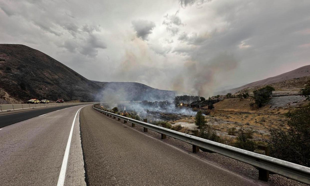 <span>The Durkee fire in eastern Oregon, the biggest active fire in the US.</span><span>Photograph: Brett Brown/AP</span>