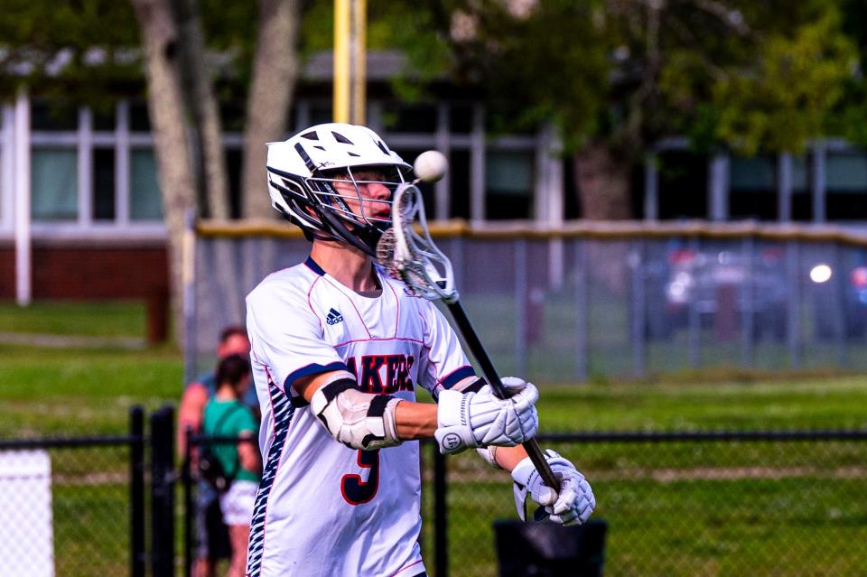 Apponequet's Jake Cusson makes the pass during a game last season.