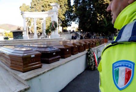 Coffins are seen ahead of the funeral service for 26 Nigerian women who died last week while crossing the Mediterranean Sea, at the Salerno cemetery, Italy, November 17, 2017. REUTERS/Ciro De Luca