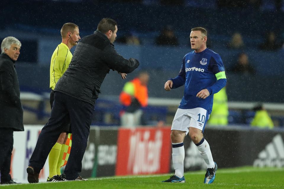 Wayne Rooney receives instructions from David Unsworth: Getty