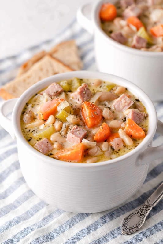 <p>Nibble and Dine</p><p>This creamy chowder with chunks of ham and white beans is filling enough for a main course and it's ready in only 30 minutes.</p><p><strong>Get the recipe: <a href="https://nibbleanddine.com/ham-and-white-bean-chowder/" rel="nofollow noopener" target="_blank" data-ylk="slk:Ham and White Bean Chowder;elm:context_link;itc:0;sec:content-canvas" class="link ">Ham and White Bean Chowder</a></strong></p>