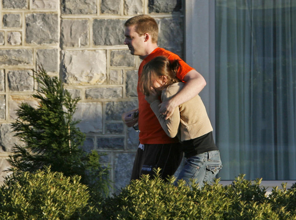 Couple leaving building on campus