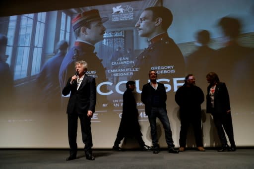 Polanski on stage with some of his cast including Oscar-winner Jean Dujardin