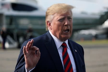 FILE PHOTO: U.S. President Donald Trump speaks to reporters before boarding Air Force One to return to Washington from Morristown Municipal Airport in Morristown, New Jersey