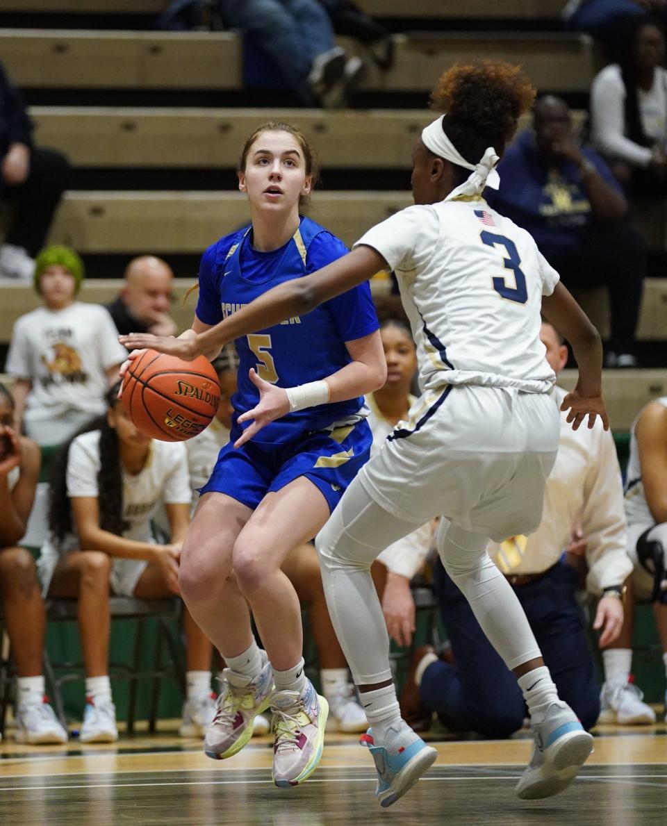 Webster-Schroeder's Addison Morgan (5) looks to make a play in the girls Class AA state semifinal game against Baldwin at Hudson Valley Community College in Troy, on Friday, March 17, 2023.