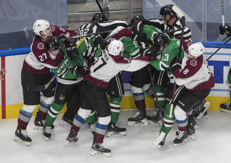 Dallas Stars and the Colorado Avalanche players rough it up during the second period of Game 3 of an NHL hockey second-round playoff series, Wednesday, Aug. 26, 2020, in Edmonton, Alberta. (Jason Franson/The Canadian Press via AP)