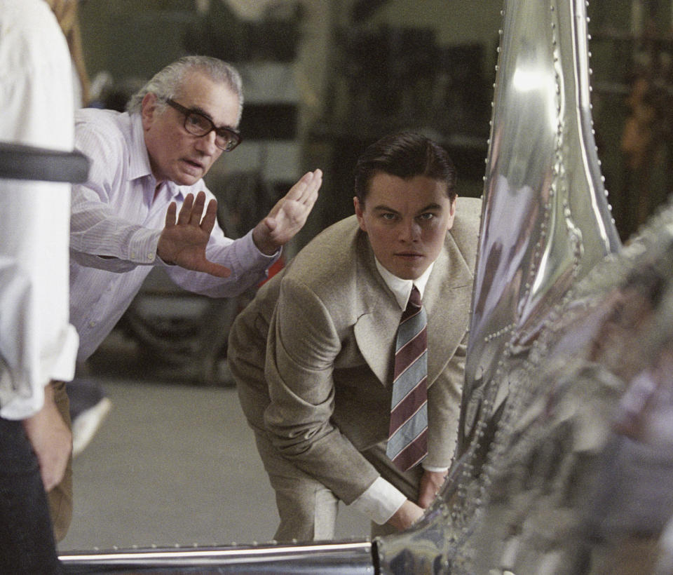 FILE - In this undated photo released by Miramax Films, director Martin Scorsese, left, directs actor Leonardo DiCaprio in the film "The Aviator." DiCaprio, who played Howard Hughes, was nominated for an Oscar for his performance in the film. He is nominated for an Academy Award this year for his performance by an actor in a leading role for 'the film, The Wolf of Wall Street." (AP Photo/Miramax Films, file)