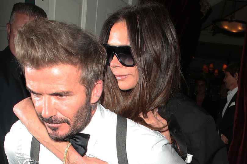 David Beckham was ever the doting husband as he valiantly carried his wife of 25 years, Victoria Beckham, out of her 50th birthday party, months after the star broke her foot