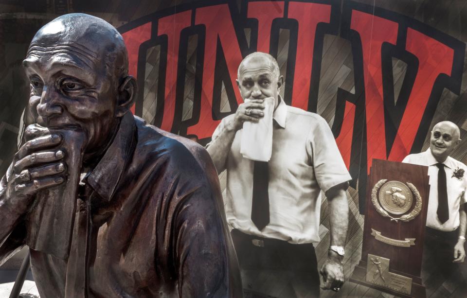 A statue and display honoring Univerisity of Las Vegas Runnin' Rebels basketball coach Jerry Tarkanian,  June 2, 2016, is seen outside the Thomas & Mack Center, in Las Vegas, Nevada. / AFP / PAUL J. RICHARDS / RESTRICTED TO EDITORIAL USE - MANDATORY MENTION OF THE ARTIST UPON PUBLICATION - TO ILLUSTRATE THE EVENT AS SPECIFIED IN THE CAPTION        (Photo credit should read PAUL J. RICHARDS/AFP via Getty Images)