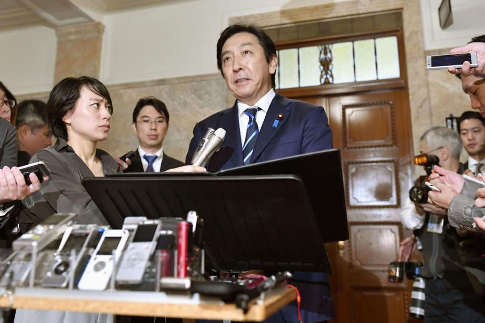 Japanese Trade Minister Isshu Sugawara speaks after a cabinet meeting at parliament in Tokyo Friday, Oct. 25, 2019. A report says Sugawara has offered his resignation on Friday after his office was accused of violating election laws. (Yoshitaka Sugawara/Kyodo News via AP)