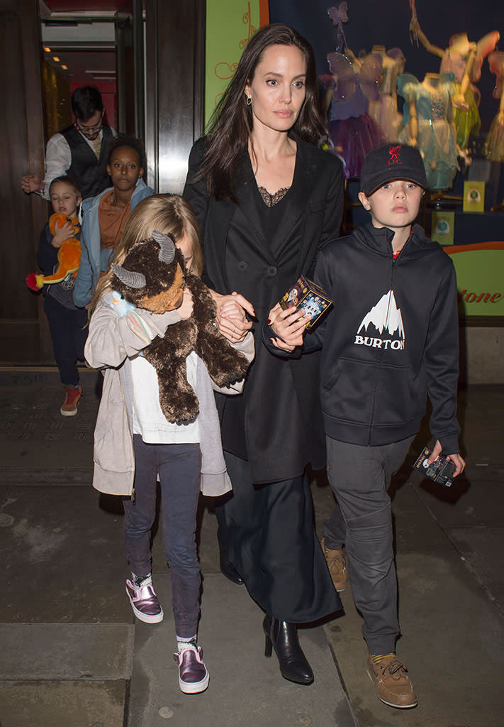 Angelina Jolie was spotted visiting a toy store in London over the weekend with a few of her children. (Photo: XPOSUREPHOTOS.COM)