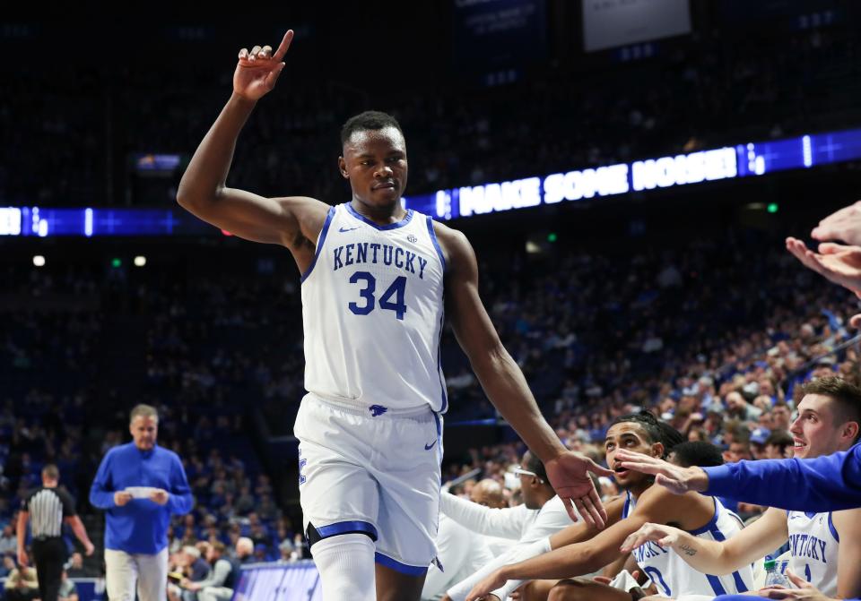 Kentucky's Oscar Tshiebwe (34) acknowledged the praise after posting a double-double against North Florida during their game at Rupp Arena in Lexington, Ky. on Nov. 23, 2022. Tshiebwe, who began his career at West Virginia, came to UK via the transfer portal.