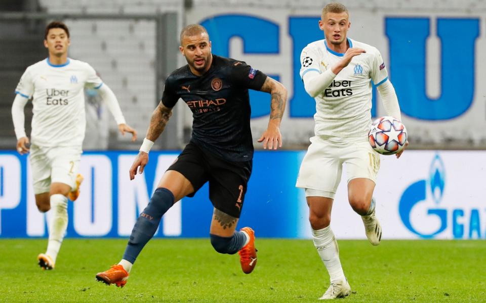 Manchester City's Kyle Walker in action with Olympique de Marseille's Michael Cuisance. - REUTERS