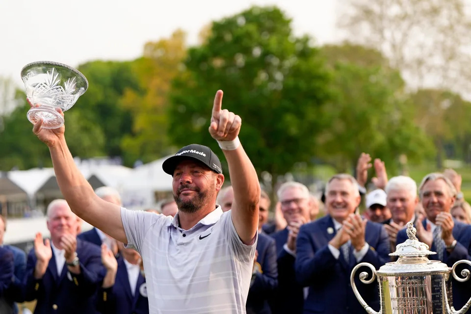 Michael Block poses with the crystal bowl he won for being the low club professional at the PGA Championship golf tournament at Oak Hill Country Club on Sunday, May 21, 2023, in Pittsford, N.Y. (AP Photo/Eric Gay)