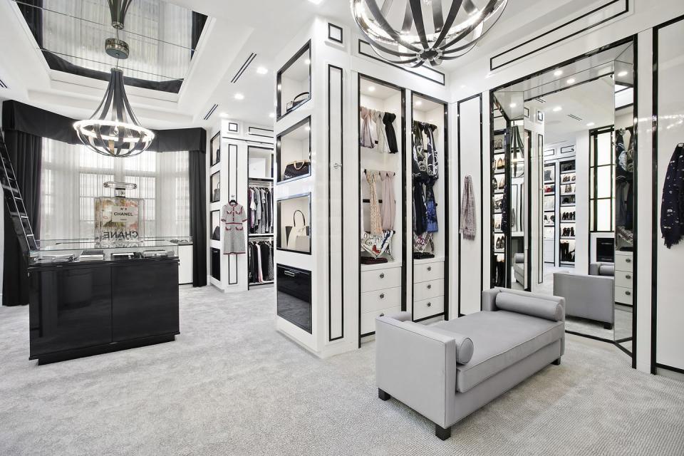 Here's the master walk-in wardrobe designed to replicate a Chanel boutique