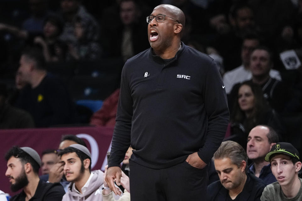 Sacramento Kings head coach Mike Brown calls to his team during the first half of an NBA basketball game against the Brooklyn Nets, Thursday, March 16, 2023, in New York. (AP Photo/Frank Franklin II)