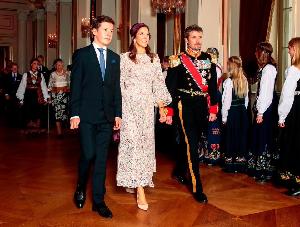 Prince Christian and Crown Princess Mary of Denmark join Prince Frederik, who is also one of Ingrid Alexandra's godfathers.