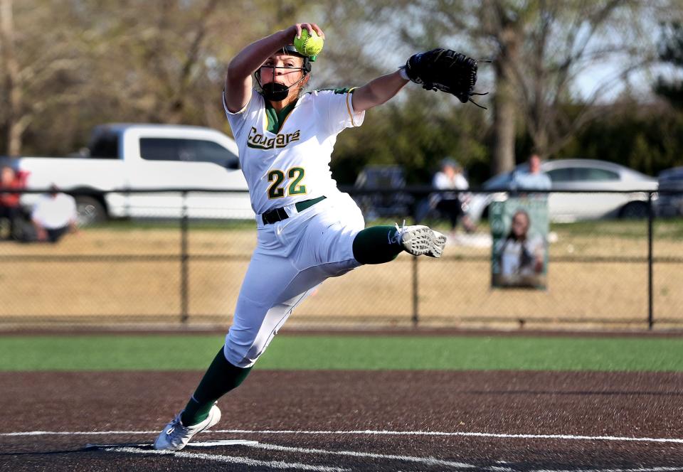Salina South junior Araceli Rivas (22) pitches during the team's 10-0 victory in five innings over Salina Central Tuesday evening, April 26, 2022. 