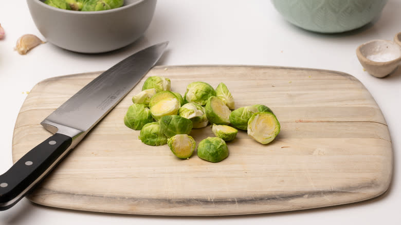 brussels sprouts on chopping board 
