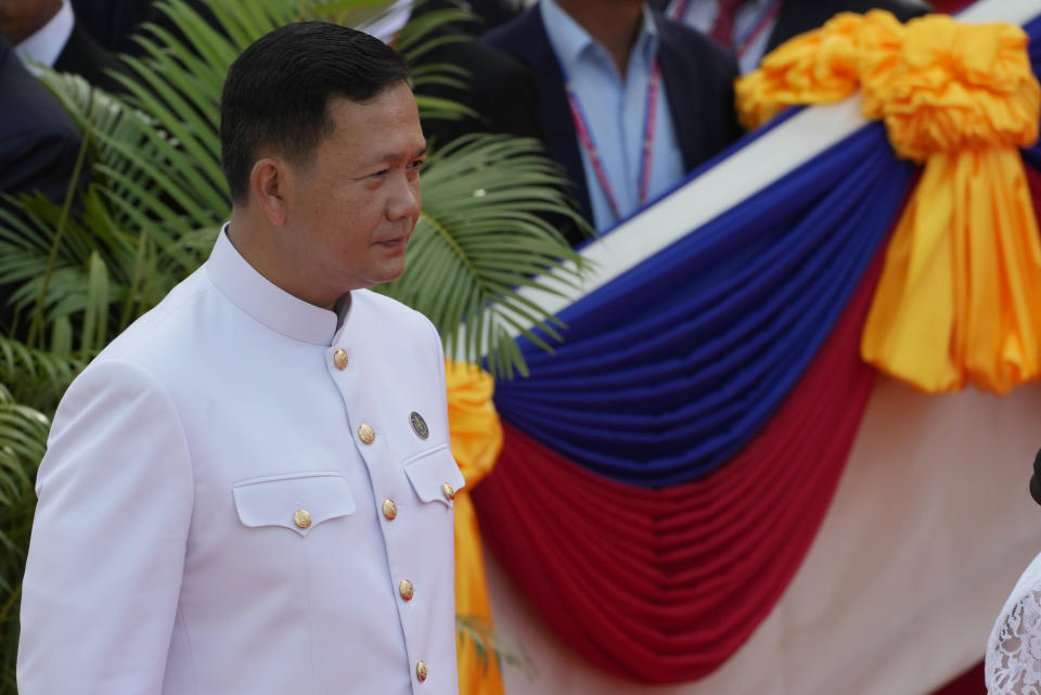 Hun Manet designate prime minister and son of Cambodia Prime Minister Hun Sen, also army chief, arrives at the National Assembly in Phnom Penh, Cambodia, Monday, Aug. 21, 2023. (AP Photo/Heng Sinith)