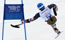 <div>CRASH - <span>Tyler Walker of the U.S. slips as he takes a jump during the men's sitting skiing downhill at the 2014 Sochi Paralympic Winter Games at Rosa Khutor.</span></div>