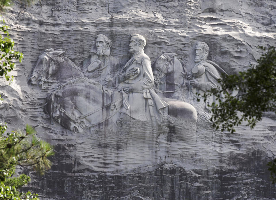 Confederate leaders etched into a rock face at Stone Mountain. (Photo: ASSOCIATED PRESS)