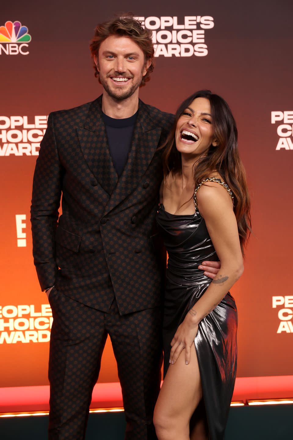 sarah shahi and adam demos make red carpet debut