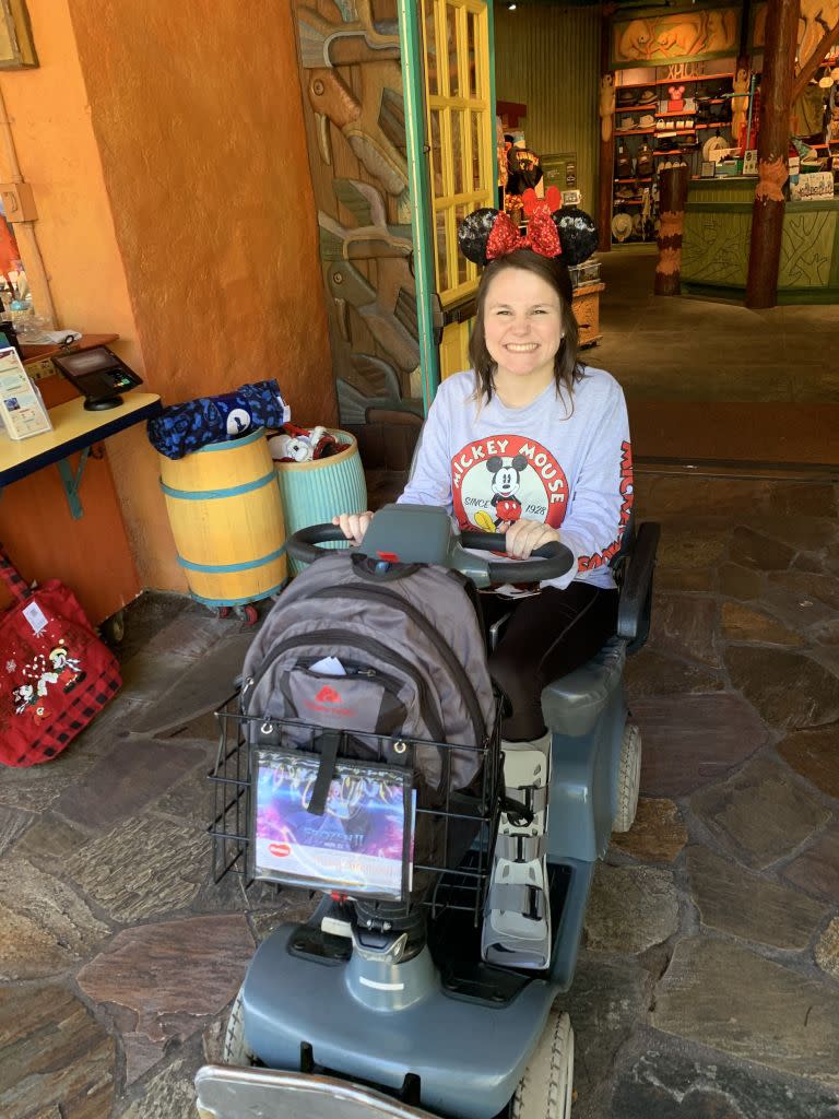 The bride rolled around the magical theme park in a scooter. Kennedy News and Media