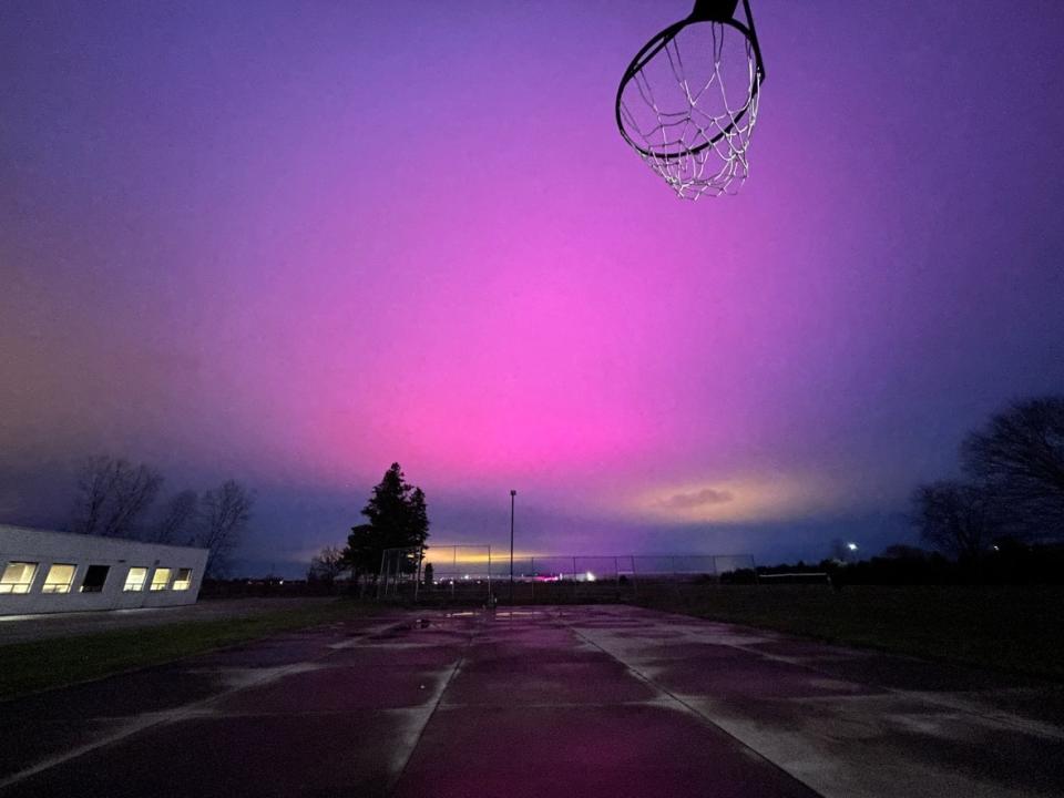Glow from greenhouses in Leamington captured on Dec. 3, 2021. Night skies like this are one of the things Lakeshore is trying to prevent by voting on a new bylaw that places restrictions on greenhouses. (Chris Ensing/CBC - image credit)