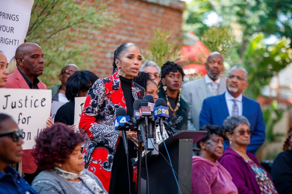 Areva Martin, attorney for the Section 14 Survivors group, speaks during a press conference in Los Angeles in 2022.