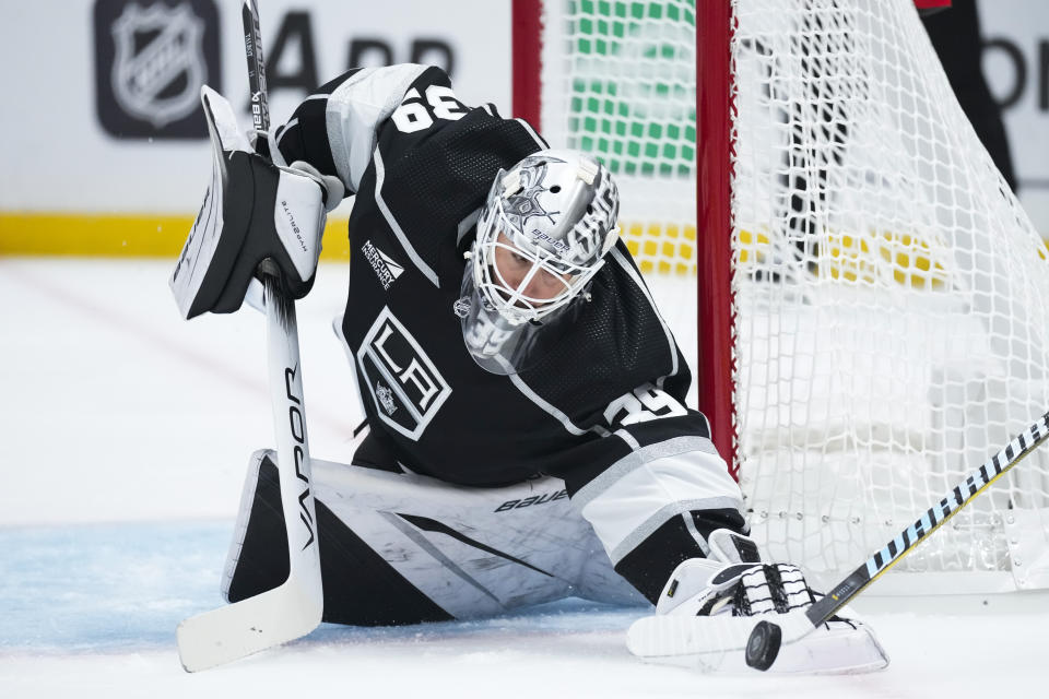 Los Angeles Kings goaltender Cam Talbot (39) stops a shot during the first period of an NHL hockey game against the Boston Bruins Saturday, Oct. 21, 2023, in Los Angeles. (AP Photo/Ashley Landis)