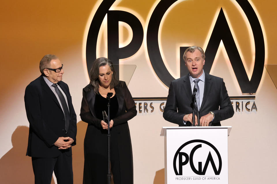(L-R) Charles Roven, Emma Thomas and Christopher Nolan at the PGA Awards on Sunday night
