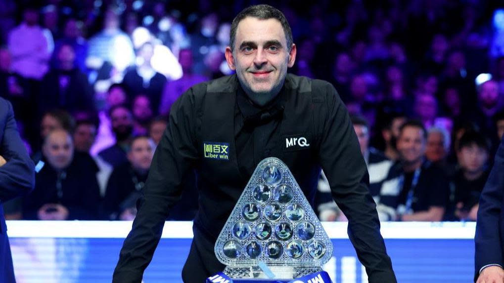 Ronnie O'Sullivan celebrates the UK Championship 