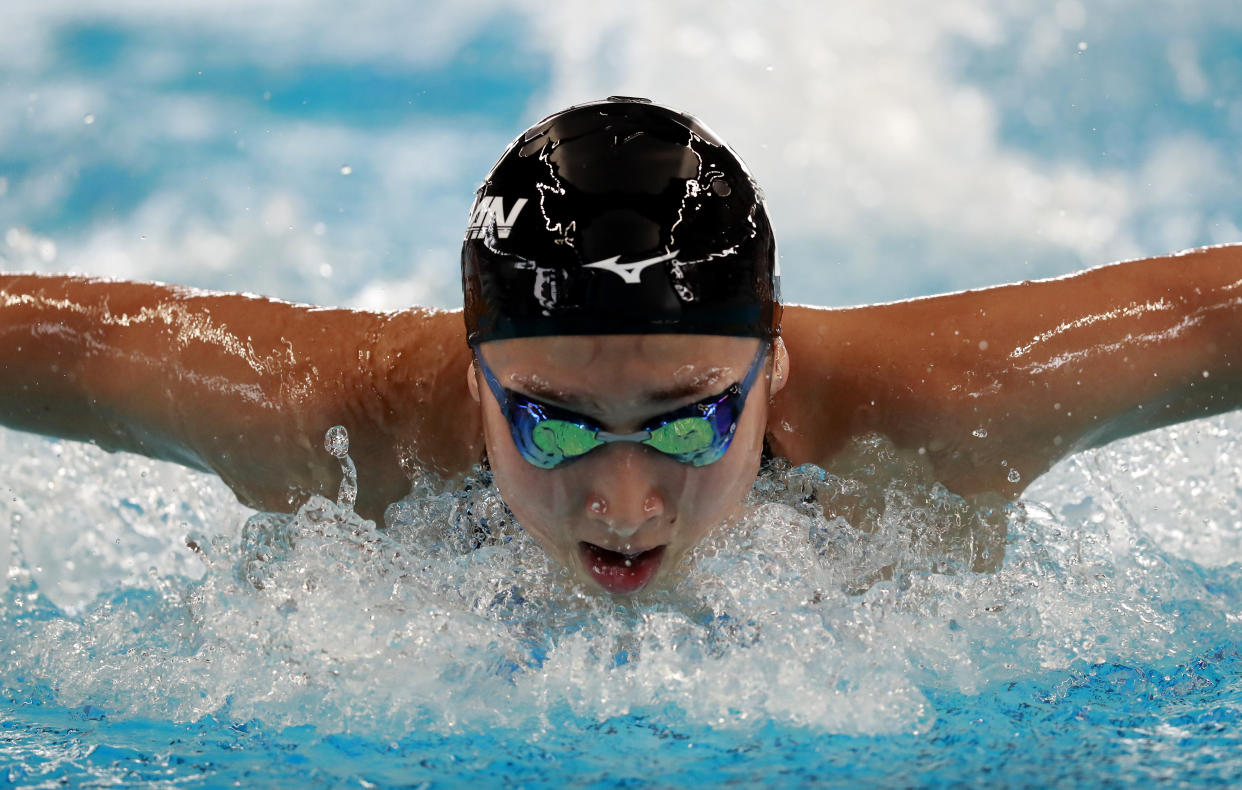 Japan's Rikako Ikee swims in her heat of the women's 100m butterfly during the swimming competition at the 18th Asian Games in Jakarta, Indonesia, Tuesday, Aug. 21, 2018. (AP Photo/Bernat Armangue)