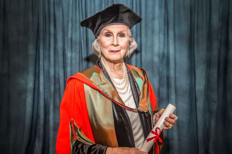 Transgender rights campaigner April Ashley receiving an honorary degree from the University of Liverpool in 2016