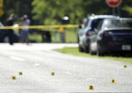 <p>Evidence markers are placed on the street at the scene of a deadly shooting outside of the Club Blu nightclub, Monday, July 25, 2016, in Fort Myers, Fla. (AP Photo/Lynne Sladky)</p>