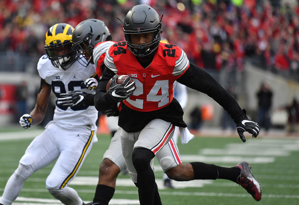 Ohio State's Malik Hooker runs for a touchdown after intercepting a pass by Michigan QB Wilton Speight (Getty Images)