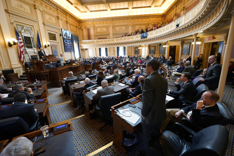 House majority leader Del. Terry Kilgore, R-Scott, standing right, seeks during debate on an emergency amendment on the school mask bill during the House session at the Capitol Wednesday Feb. 16, 2022, in Richmond, Va. The House passed the measure. (AP Photo/Steve Helber)