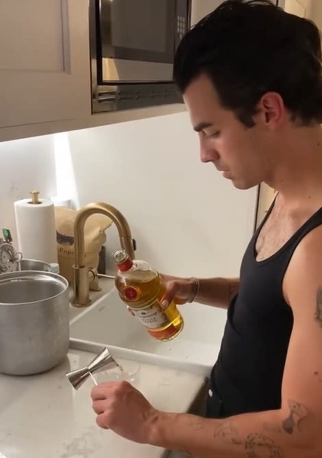 Joe making a cocktail