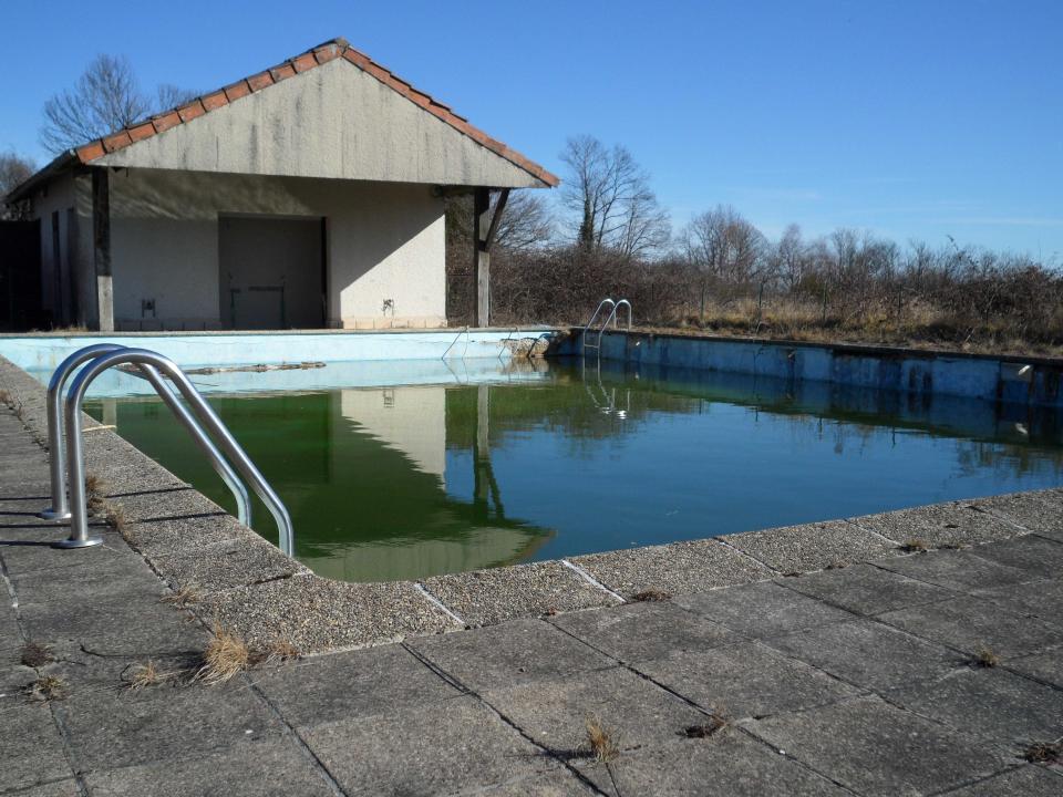 In this photo taken Tuesday Feb. 28, 2012, the swimming pool in the French village of Saint Nicolas Courbefy, in Limousin, a region in central France is seen. The entire hamlet is for sale and carried an asking price of just euro 300,000 ($440,000), the cost of a studio apartment in Paris. (AP Photo/Sarah DiLorenzo)