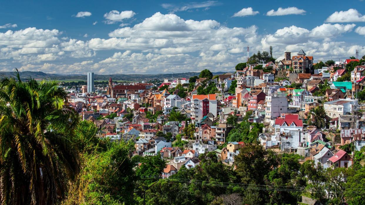 City of Antananarivo at sunny day with fluffy clouds in the sky.