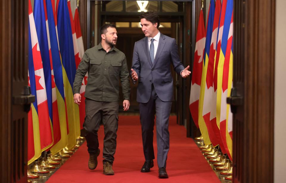 Ukrainian President Volodymyr Zelensky (left) and Canadian Prime Minister Justin Trudeau signed the modernized Canada-Ukraine Free Trade Agreement on Friday. (Photo by Patrick Doyle/Pool/AFP via Getty Images)