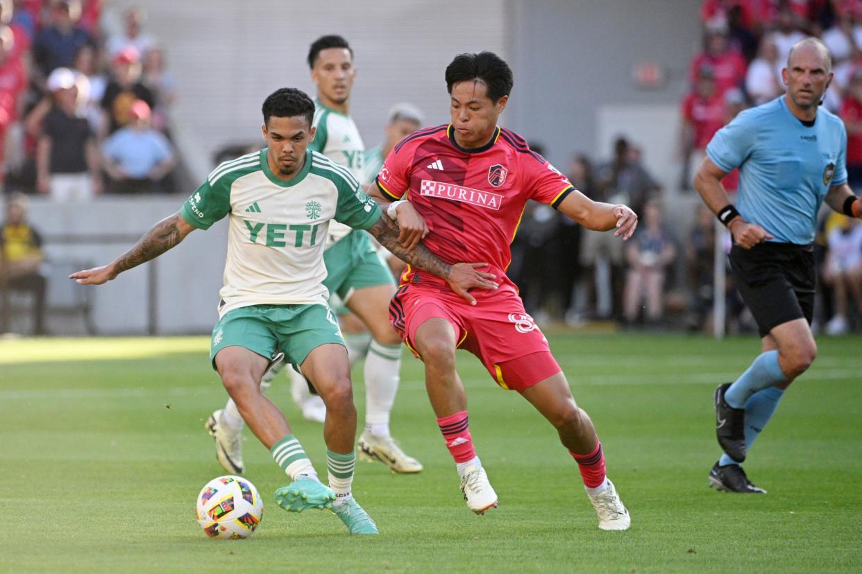 Austin FC midfielder Dani Pereira and St. Louis City SC midfielder Hosei Kijma battle for the ball during the second half of their match on Sunday. Austin FC lost 1-0.