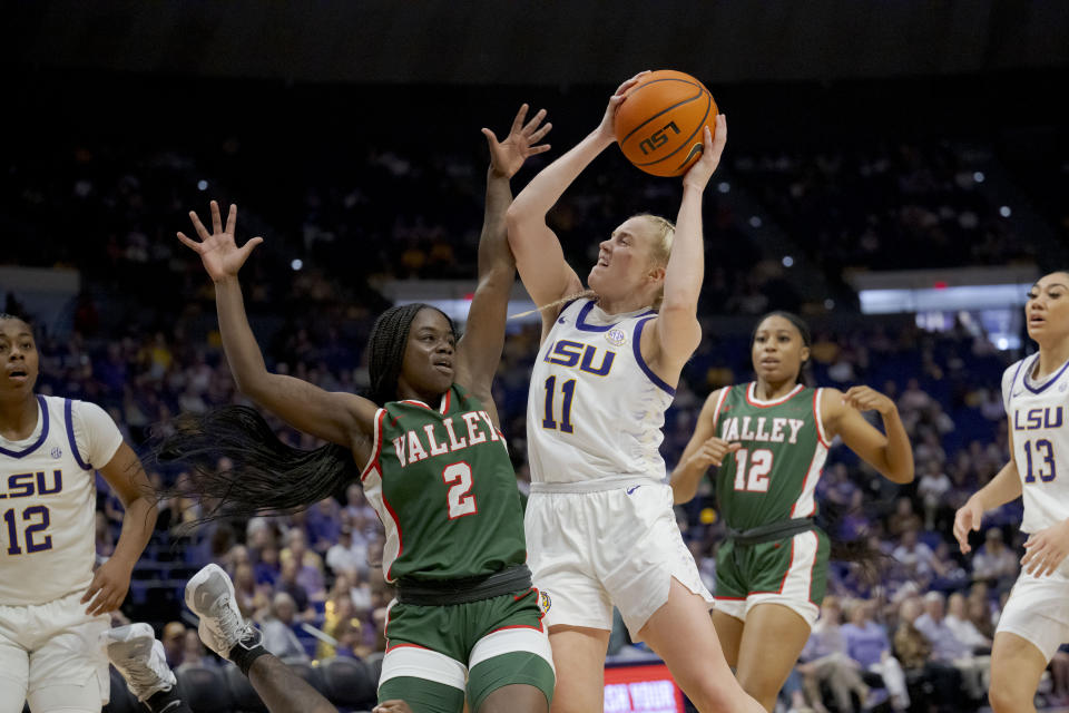 LSU guard Hailey Van Lith (11) shoots against Mississippi Valley State guard Jaylia Reed (2) during the first half of an NCAA basketball game on Friday, Dec. 4, 2020 in Baton Rouge, La. (AP Photo/Matthew Hinton)