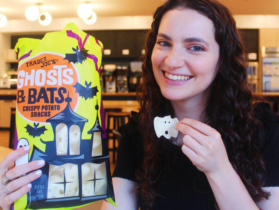 talia lakritz with trader joes ghosts and bats snacks