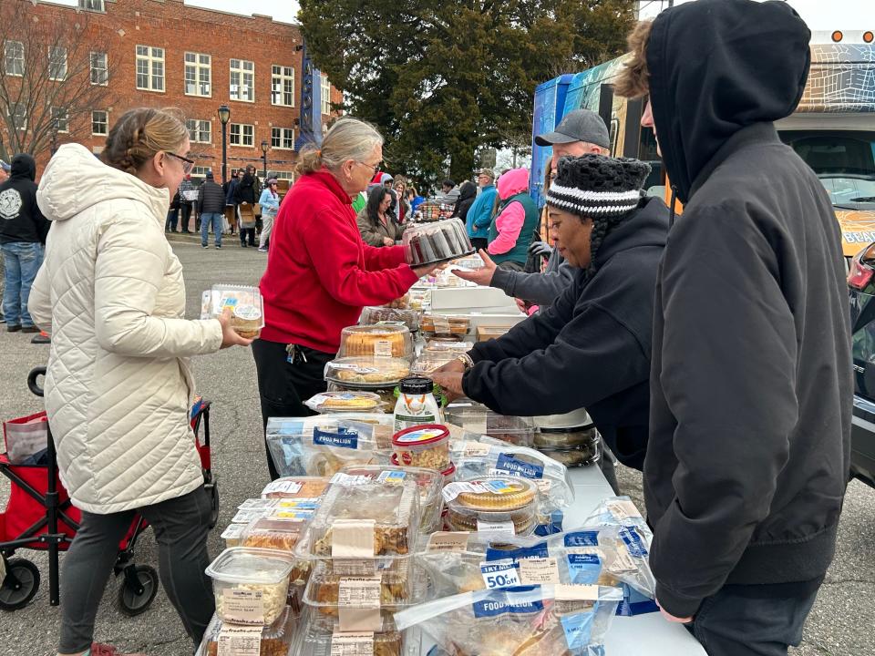 A couple hundred people lined up Friday, Feb. 16, 2024 for Beacon Hill Church's 'Free Food Friday' in downtown Hopewell. It was the first giveaway since City Council voted unanimously to allow the event to stay where it is.