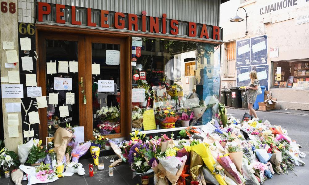 People leave flowers out the front of Pellegrini’s Espresso Bar in respect for Sisto Malaspina on November 12, 2018 in Melbourne, Australia.